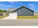 Spacious two-car garage with a concrete driveway and well-maintained lawn at 383 Hayloft Circle, Conway, SC 29526