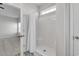 Shower with white shower curtain and decorative tile floor in attached room at 383 Hayloft Circle, Conway, SC 29526