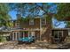 The rear exterior showcases a patio with outdoor seating and a view of the inviting in-ground pool at 4003 N Ocean Blvd., Myrtle Beach, SC 29577