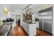 Well-equipped kitchen with a center island, stainless steel appliances, and hardwood floors, perfect for cooking at 4003 N Ocean Blvd., Myrtle Beach, SC 29577