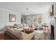 Cozy living room featuring comfortable seating, fireplace, and plenty of natural light, creating a welcoming atmosphere at 4003 N Ocean Blvd., Myrtle Beach, SC 29577