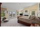 Spacious main bedroom with a fireplace and access to a balcony with ocean views at 4003 N Ocean Blvd., Myrtle Beach, SC 29577