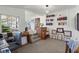 Cozy office space with custom built-in bookshelves, natural light, and view to the sunroom at 4003 N Ocean Blvd., Myrtle Beach, SC 29577
