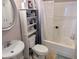 Full bath featuring a vanity, commode, and shower-tub combination with shower curtain at 407 24Th Ave. N # 302, North Myrtle Beach, SC 29582