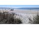 Enjoy beach access via this sandy pathway with distant ocean view at 407 24Th Ave. N # 302, North Myrtle Beach, SC 29582