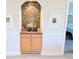 Breakfast bar nook with cabinets, mosaic tile backsplash, and artwork at 407 24Th Ave. N # 302, North Myrtle Beach, SC 29582