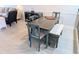 Dining area adjacent to living room with dining table and chairs at 407 24Th Ave. N # 302, North Myrtle Beach, SC 29582