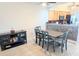 Dining area with modern table set next to kitchen at 407 24Th Ave. N # 302, North Myrtle Beach, SC 29582