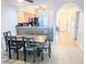 Dining room adjacent to kitchen and hallway, with dining table and chairs at 407 24Th Ave. N # 302, North Myrtle Beach, SC 29582