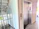 Hallway shot of the elevator near stairs at 407 24Th Ave. N # 302, North Myrtle Beach, SC 29582