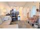 Open living area leading to dining table, breakfast bar and entry to bedroom at 407 24Th Ave. N # 302, North Myrtle Beach, SC 29582