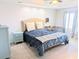 Bright main bedroom with neutral tones, a ceiling fan, and shuttered windows at 407 24Th Ave. N # 302, North Myrtle Beach, SC 29582