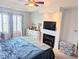 This main bedroom features recessed lighting, a fireplace, a ceiling fan, and large windows at 407 24Th Ave. N # 302, North Myrtle Beach, SC 29582