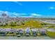 Wide aerial view of homes lining the canal with views of the waterway and a distant skyline at 414 32Nd Ave. N, North Myrtle Beach, SC 29582