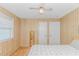 Comfortable bedroom with a ceiling fan, bright windows, and two closets at 414 32Nd Ave. N, North Myrtle Beach, SC 29582