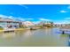 Beautiful waterfront homes line the canal, each featuring docks and outdoor spaces for enjoying the view at 414 32Nd Ave. N, North Myrtle Beach, SC 29582