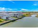 Waterfront homes along a tranquil canal, featuring docks and scenic views of the surrounding landscape at 414 32Nd Ave. N, North Myrtle Beach, SC 29582