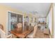 Open living room with furniture, sliding doors, and great natural lighting at 414 32Nd Ave. N, North Myrtle Beach, SC 29582