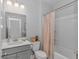 Clean bathroom offers a shower-tub combination and a modern sink and vanity at 456 Cattle Drive Circle, Myrtle Beach, SC 29588