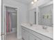 This bathroom has double sinks and a shower/tub combination at 456 Cattle Drive Circle, Myrtle Beach, SC 29588
