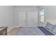 Neutral bedroom features two closets and a large window for natural light at 456 Cattle Drive Circle, Myrtle Beach, SC 29588