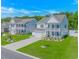 Beautiful two-story home with charming curb appeal and well-manicured lawn at 456 Cattle Drive Circle, Myrtle Beach, SC 29588
