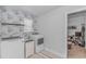 This laundry room features updated washer and dryer appliances at 456 Cattle Drive Circle, Myrtle Beach, SC 29588