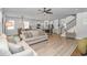 Open-concept living room with seamless flow to the kitchen, dining area and staircase at 456 Cattle Drive Circle, Myrtle Beach, SC 29588