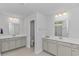 This spacious main bathroom features double sinks, ceramic tile flooring, and a separate shower area at 456 Cattle Drive Circle, Myrtle Beach, SC 29588