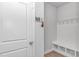 Functional mud room with built-in bench, storage cubbies and coat hooks for easy organization at 456 Cattle Drive Circle, Myrtle Beach, SC 29588