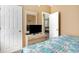 This bedroom has a dresser, mirror, and doorway to another room, providing ample space and functionality at 488 River Oaks Dr. # 61F, Myrtle Beach, SC 29579