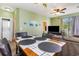 Open dining area with seating for four, connecting to the living room and kitchen at 488 River Oaks Dr. # 61F, Myrtle Beach, SC 29579