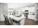 Gourmet kitchen features stainless steel appliances, granite countertops, and a breakfast bar with seating at 527 Magnolia Terrace Dr, Myrtle Beach, SC 29579