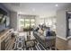 Open concept living space featuring a large window with scenic views and hardwood floors at 527 Magnolia Terrace Dr, Myrtle Beach, SC 29579