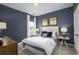 Stylishly appointed bedroom showcasing a plush bed, elegant decor, and soft natural light at 527 Magnolia Terrace Dr, Myrtle Beach, SC 29579
