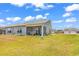 The spacious backyard features a covered porch, ideal for outdoor entertaining and relaxation at 528 Courtridge Loop, Conway, SC 29526