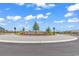 The community entrance features a beautiful roundabout with lush flowers and attractive signage at 528 Courtridge Loop, Conway, SC 29526