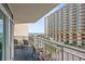 Beautiful balcony with seating, offering stunning beach and ocean views at 5300 N Ocean Blvd. # 422, Myrtle Beach, SC 29572