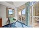 Bedroom featuring a mirror, chair, and balcony access to gorgeous views and outdoor seating at 5300 N Ocean Blvd. # 422, Myrtle Beach, SC 29572