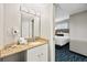 Well-lit bathroom with granite countertop vanity, mirror and decor at 5300 N Ocean Blvd. # 422, Myrtle Beach, SC 29572