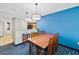 Cozy dining area adjacent to the kitchen, featuring a large table, bar seating, and modern lighting at 5300 N Ocean Blvd. # 422, Myrtle Beach, SC 29572