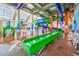 Indoor waterpark featuring slides and colorful designs, ideal for year-round entertainment and Gathering fun at 5300 N Ocean Blvd. # 422, Myrtle Beach, SC 29572