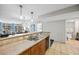 Bright kitchen and dining area featuring granite countertops and easy access to bathroom at 5300 N Ocean Blvd. # 422, Myrtle Beach, SC 29572