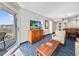 Bright living room with balcony access, ocean views, comfortable seating, and an open floorplan at 5300 N Ocean Blvd. # 422, Myrtle Beach, SC 29572