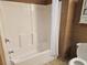 Clean bathroom featuring a shower and tub combo with tile surround and modern fixtures at 5300 N Ocean Blvd. # 518, Myrtle Beach, SC 29577