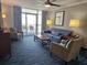 Cozy living room with comfortable seating, a private balcony, and an ocean view for relaxing vacations at 5300 N Ocean Blvd. # 518, Myrtle Beach, SC 29577