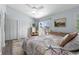 Cozy bedroom with large windows, comfortable bedding, and ample storage, creating a relaxing and inviting atmosphere at 55 Shadow Moss Pl. # 55, North Myrtle Beach, SC 29582