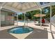 Relaxing hot tub and pool area for leisure and relaxation featuring lounge chairs and shaded areas with umbrellas at 55 Shadow Moss Pl. # 55, North Myrtle Beach, SC 29582