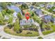 Gorgeous aerial view of home highlighting the large lot, mature landscaping, and proximity to the lake at 552 Enoree Ct., Myrtle Beach, SC 29588