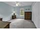 Comfortable bedroom with ample natural light, soft carpet, and a ceiling fan, offering a tranquil retreat at 552 Enoree Ct., Myrtle Beach, SC 29588